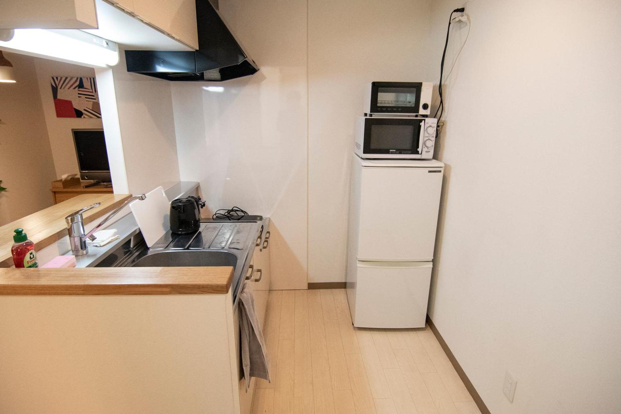 Tsubaki Garden Appartement Sapporo Kamer foto