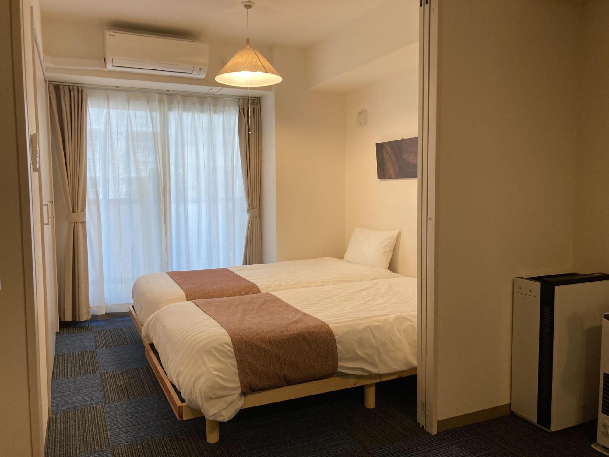 Tsubaki Garden Appartement Sapporo Kamer foto