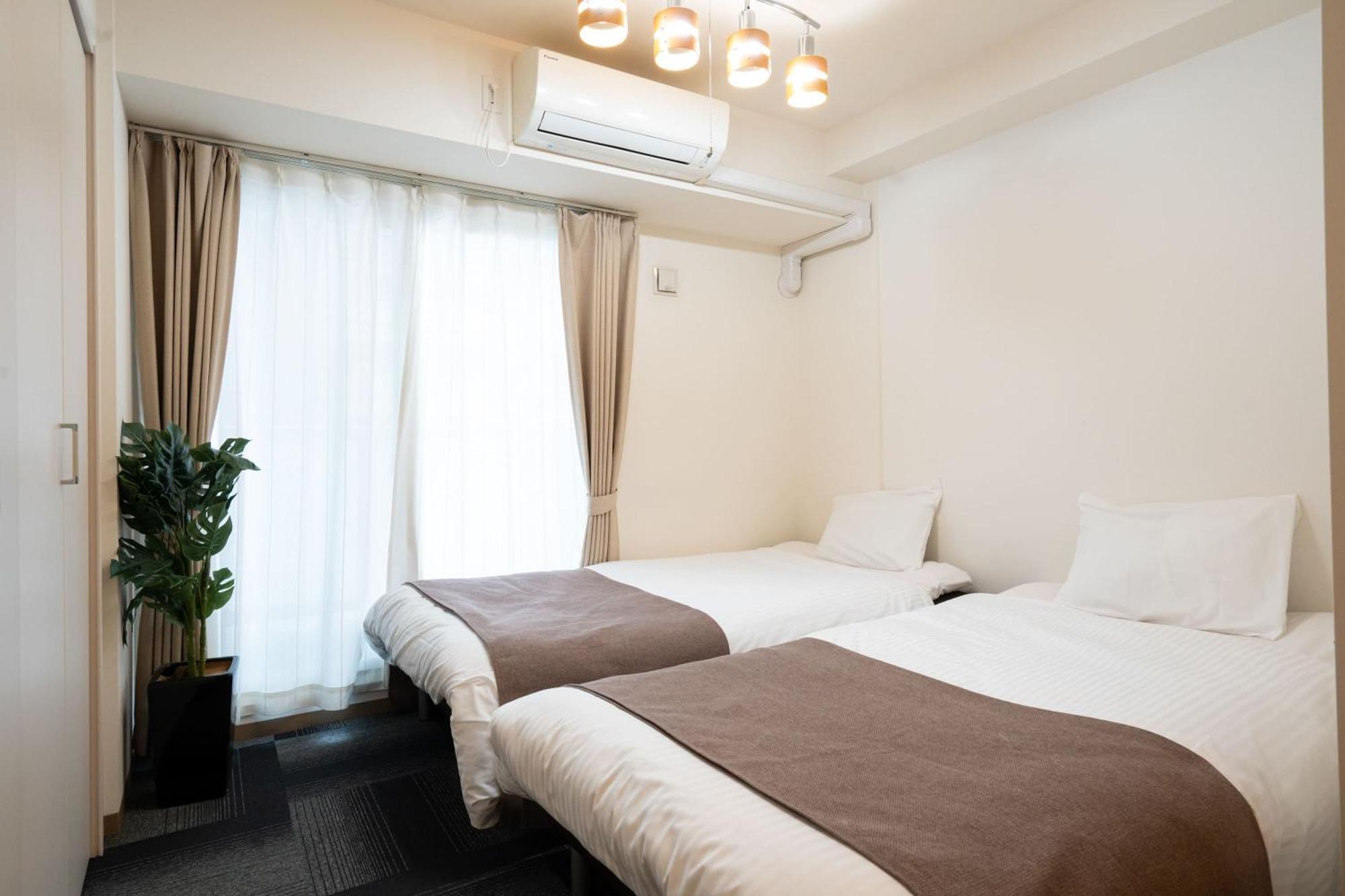 Tsubaki Garden Appartement Sapporo Kamer foto
