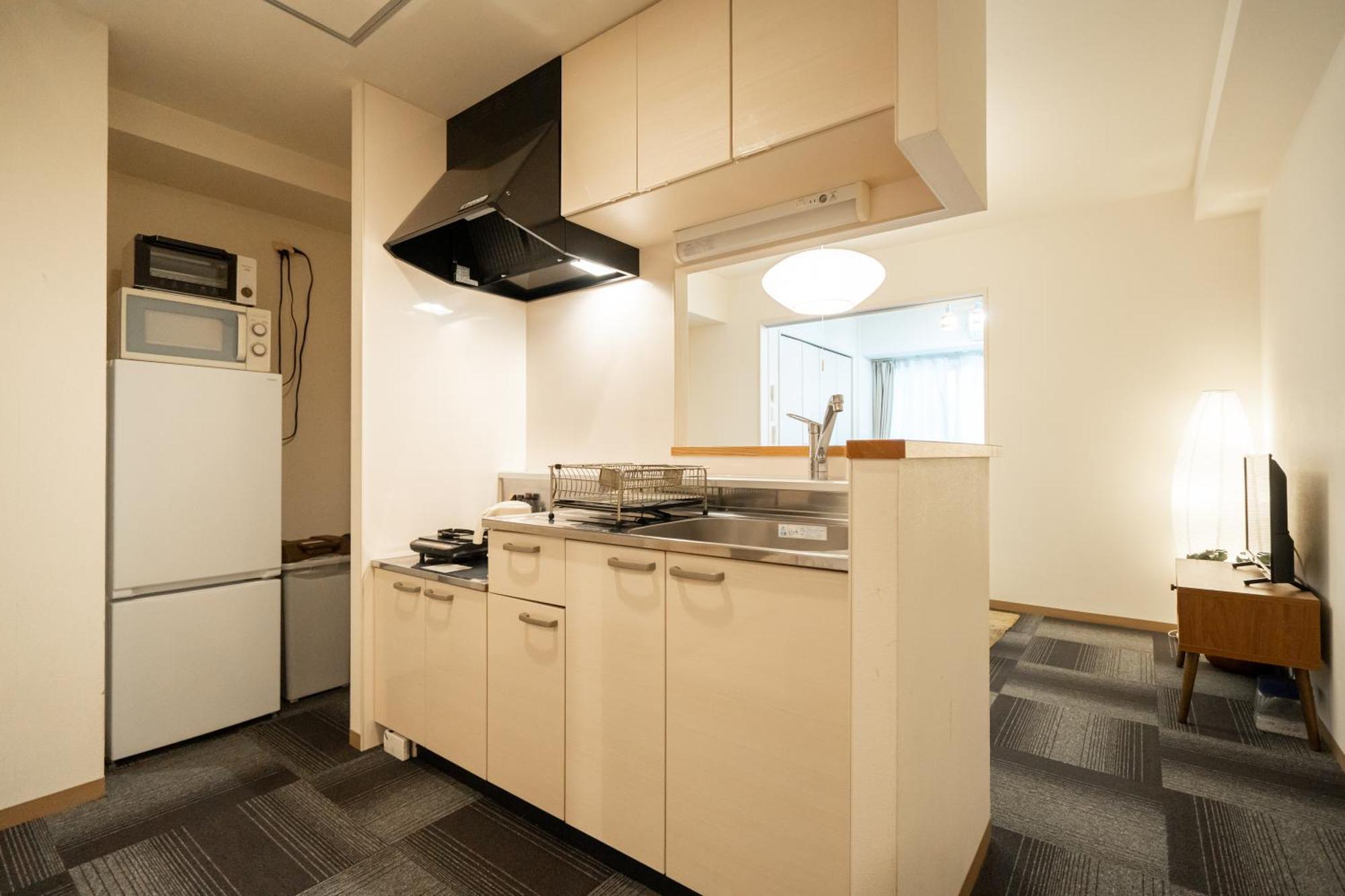 Tsubaki Garden Appartement Sapporo Kamer foto